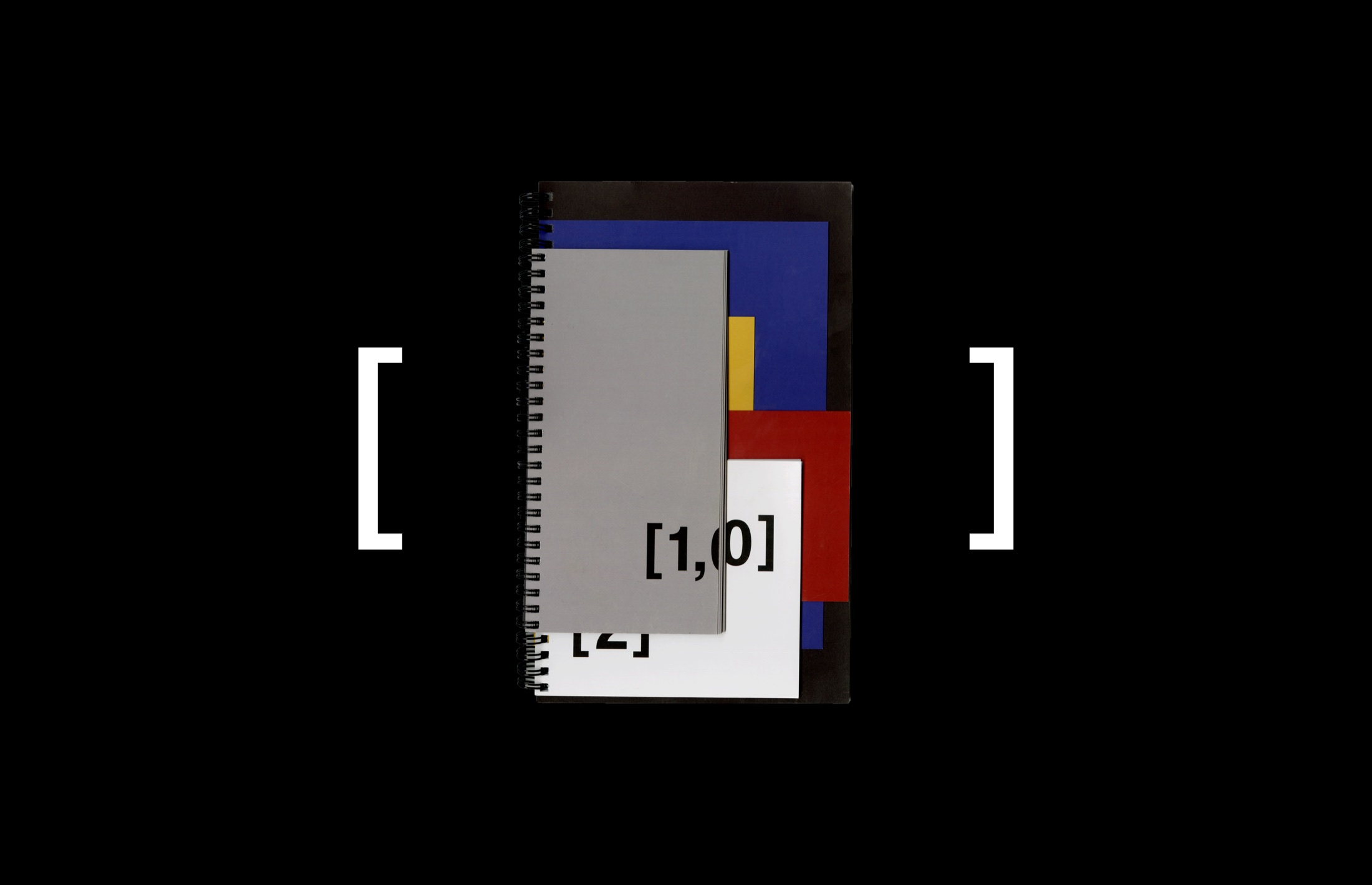 The [1,0,2,4] interactive book arranged on a black background