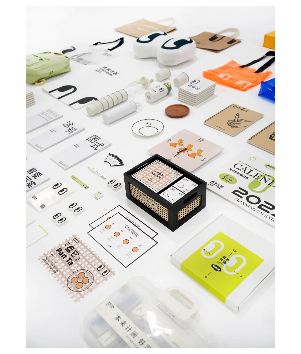 Benlai Art Education visual identity applied across printed materials, packaging, cards, and objects