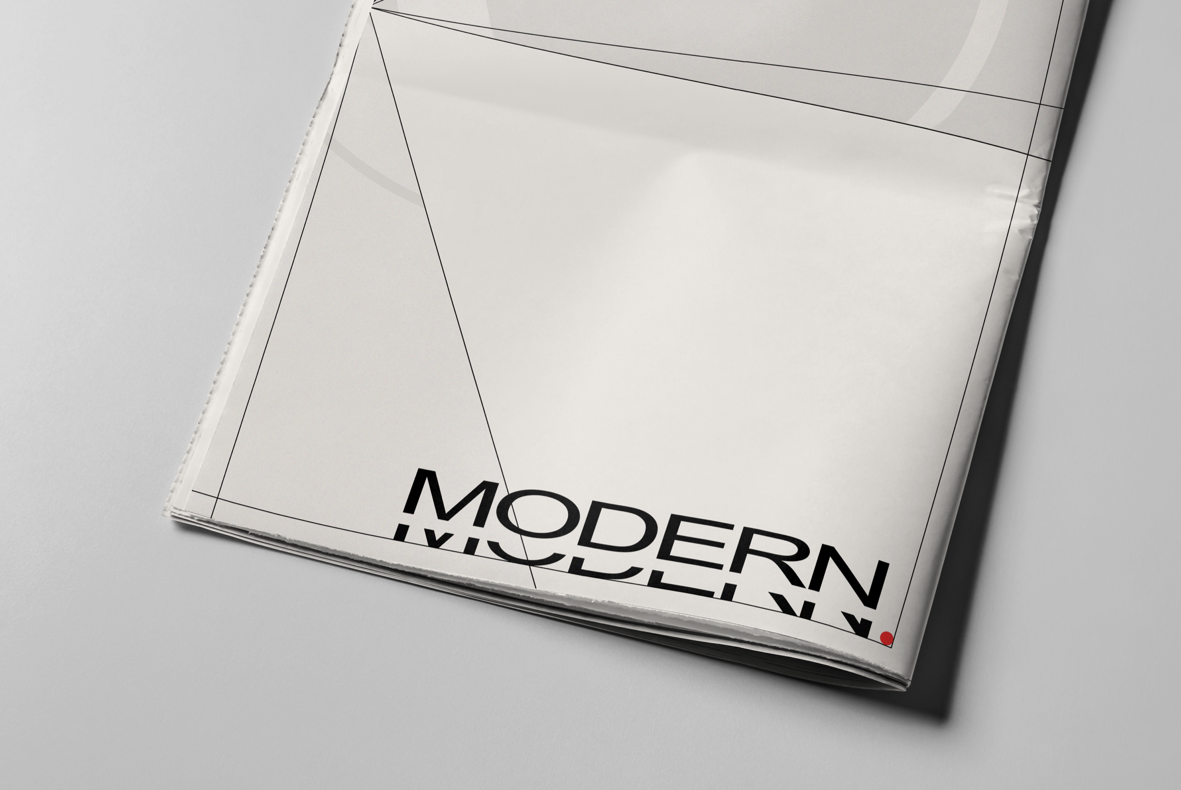 Close view of the Modern Underground printed cover with black rules and a red dot