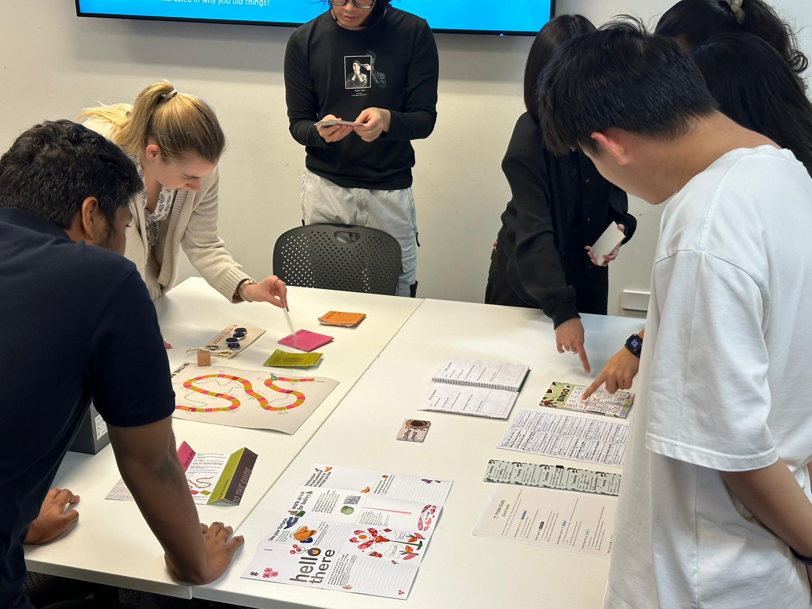 Students sharing and discussing research activities in Human-Centred Design Research Methods